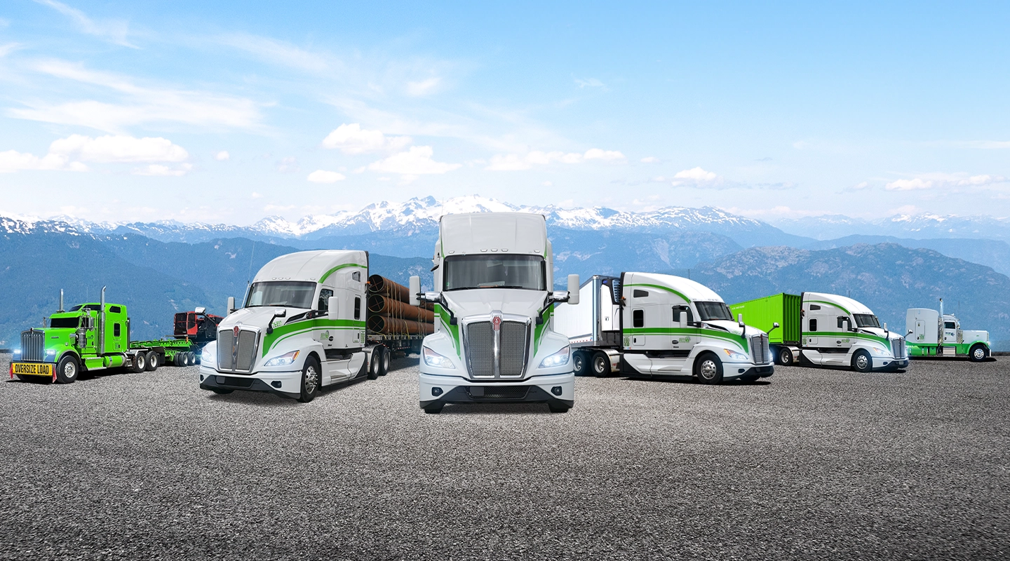 Seven Horses fleet hauling construction equipment, project materials, dry freight, refrigerated goods, container freight parked in front of BC mountains